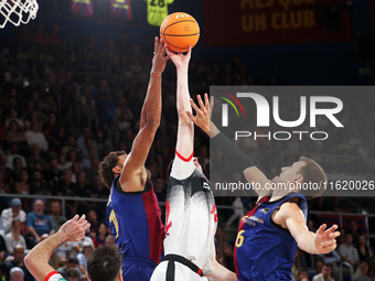 Jan Vesely and Jabari Parker play during the match between FC Barcelona and Coviran Granada, corresponding to week 1 of the Liga Endesa, at...