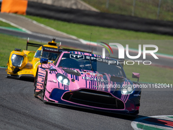 Martin Berry (SGP), Lorcan Hanafin (GBR), and Jonathan Adam (GBR) of the team Grid Motorsport by TF drive an Aston Martin Vantage AMR LMGT3...