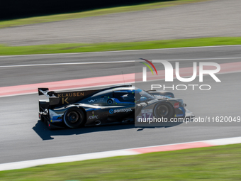 Miguel Cristovao (PRT), Cedric Oltramare (CHE), and Manuel Espirito Santo (PRT) of team COOL RACING race a Ligier JS P320 - Nissan during an...