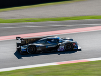 Miguel Cristovao (PRT), Cedric Oltramare (CHE), and Manuel Espirito Santo (PRT) of team COOL RACING race a Ligier JS P320 - Nissan during an...