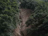 A general view of the downhill section from where the mud slides down the highway in Jhyaple Khola in Dhading District of Central Nepal on S...