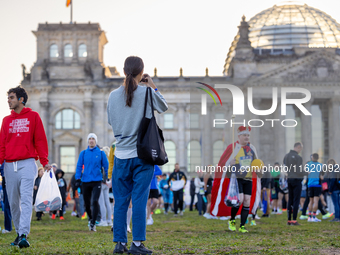 Runners arrive for the 50th Berlin Marathon in Berlin, Germany, on September 29, 2024. The 50th Berlin Marathon brings together over 58,000...