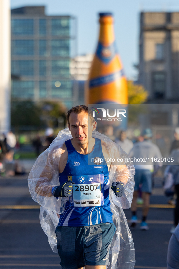 Runners arrive for the 50th Berlin Marathon in Berlin, Germany, on September 29, 2024. The 50th Berlin Marathon brings together over 58,000...