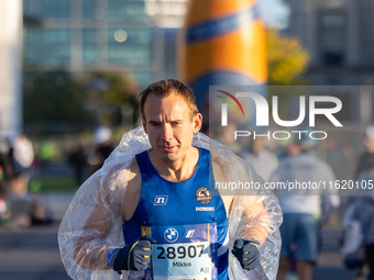 Runners arrive for the 50th Berlin Marathon in Berlin, Germany, on September 29, 2024. The 50th Berlin Marathon brings together over 58,000...