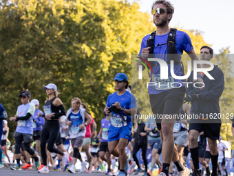 Participants of the Handbike category during the Berlin Marathon in Berlin, Germany, on September 29, 2024. The 50th Berlin Marathon brings...