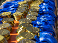 Volunteers organize medals to welcome the finishers of the Berlin Marathon in Berlin, Germany, on September 29, 2024. The 50th Berlin Marath...