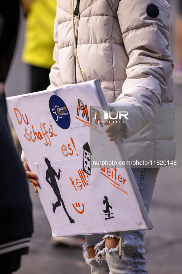 Spectators cheer on the runners during the 50th Berlin Marathon in Berlin, Germany, on September 29, 2024. The 50th Berlin Marathon brings t...