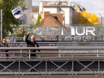 Spectators cheer on the runners during the 50th Berlin Marathon in Berlin, Germany, on September 29, 2024. The 50th Berlin Marathon brings t...