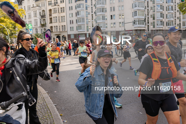 Spectators cheer on the runners during the 50th Berlin Marathon in Berlin, Germany, on September 29, 2024. The 50th Berlin Marathon brings t...