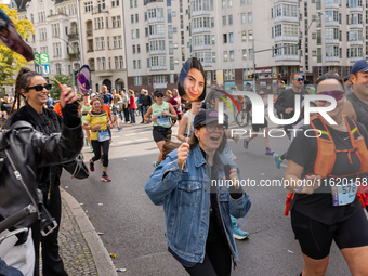 Spectators cheer on the runners during the 50th Berlin Marathon in Berlin, Germany, on September 29, 2024. The 50th Berlin Marathon brings t...