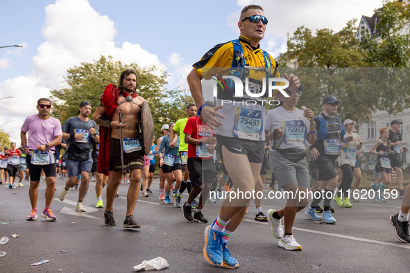 Participants of the Handbike category during the Berlin Marathon in Berlin, Germany, on September 29, 2024. The 50th Berlin Marathon brings...