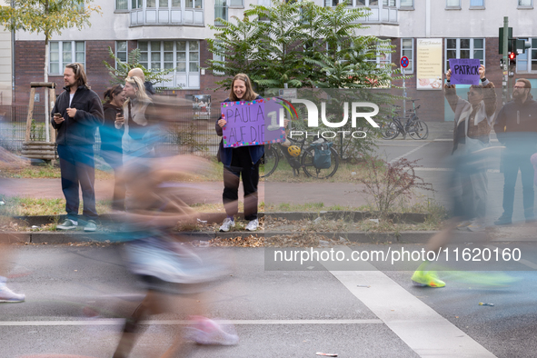 Spectators cheer on the runners during the 50th Berlin Marathon in Berlin, Germany, on September 29, 2024. The 50th Berlin Marathon brings t...