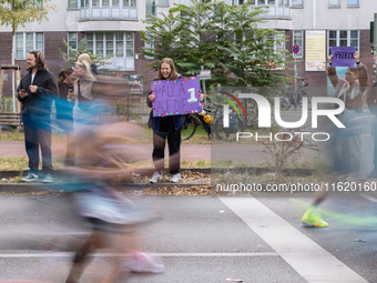 Spectators cheer on the runners during the 50th Berlin Marathon in Berlin, Germany, on September 29, 2024. The 50th Berlin Marathon brings t...