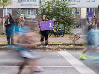 Spectators cheer on the runners during the 50th Berlin Marathon in Berlin, Germany, on September 29, 2024. The 50th Berlin Marathon brings t...