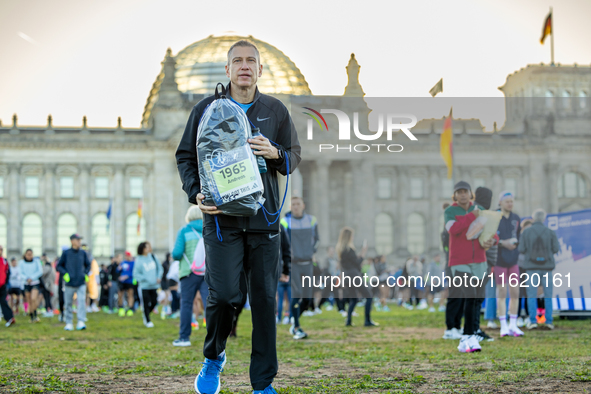 Runners arrive for the 50th Berlin Marathon in Berlin, Germany, on September 29, 2024. The 50th Berlin Marathon brings together over 58,000...