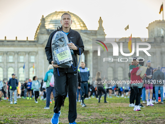 Runners arrive for the 50th Berlin Marathon in Berlin, Germany, on September 29, 2024. The 50th Berlin Marathon brings together over 58,000...