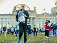 Runners arrive for the 50th Berlin Marathon in Berlin, Germany, on September 29, 2024. The 50th Berlin Marathon brings together over 58,000...