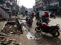 A section of walkways in Imadol, Lalitpur, Nepal, caves in after torrential rainfall and waterlogging on September 29, 2024. Nepal witnesses...