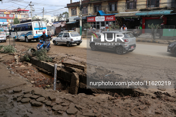 A section of walkways in Imadol, Lalitpur, Nepal, caves in after torrential rainfall and waterlogging on September 29, 2024. Nepal witnesses...