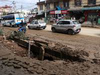 A section of walkways in Imadol, Lalitpur, Nepal, caves in after torrential rainfall and waterlogging on September 29, 2024. Nepal witnesses...