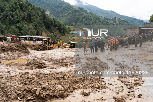 Rescue teams conduct search operations at Jhyaple Khola, Dhading District, Nepal, on September 29, 2024, after passenger buses are buried in...