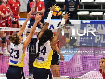 Leandra Olinga Andela of Pinerolo blocks the attack during the International Trophy ''Una squadra per un sorriso,'' Final 3rd-4th place matc...