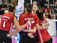 Olympiacos Athens celebrates the team's International Trophy ''Una squadra per un sorriso'' during the final 3rd-4th place match between Was...