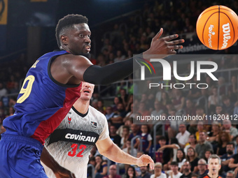 Youssoupha Fall plays during the match between FC Barcelona and Coviran Granada, corresponding to week 1 of the Liga Endesa, at the Palau Bl...