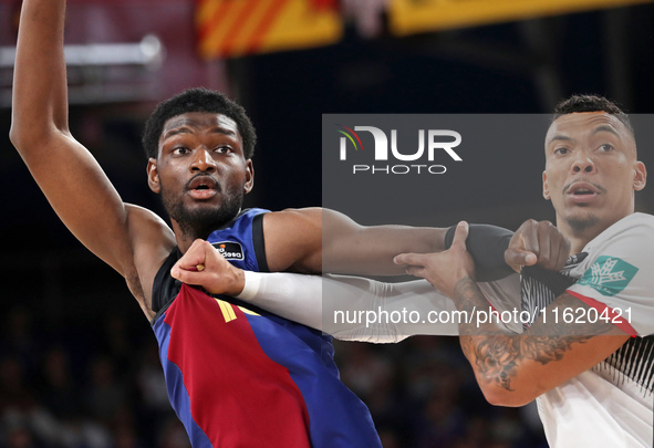 Jacob Wiley and Chimezie Metu play during the match between FC Barcelona and Coviran Granada, corresponding to week 1 of the Liga Endesa, at...