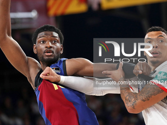 Jacob Wiley and Chimezie Metu play during the match between FC Barcelona and Coviran Granada, corresponding to week 1 of the Liga Endesa, at...