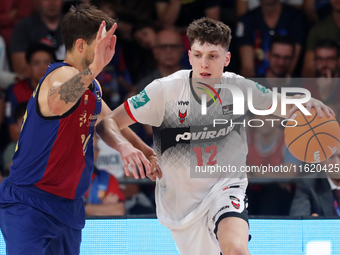 Agustin Ubal and Nicolas Laprovittola play during the match between FC Barcelona and Coviran Granada, corresponding to week 1 of the Liga En...