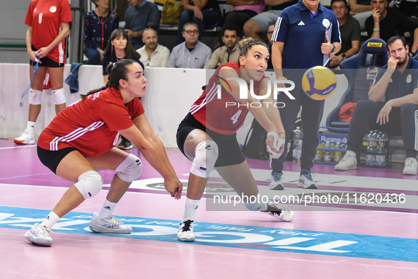 #18 Yasmine Abderrahim and #4 Ivana Vanjak of Olympiacos Athens are in action during the International Trophy ''Una squadra per un sorriso,'...