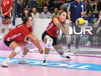 #18 Yasmine Abderrahim and #4 Ivana Vanjak of Olympiacos Athens are in action during the International Trophy ''Una squadra per un sorriso,'...