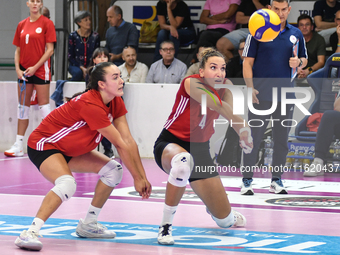 #18 Yasmine Abderrahim and #4 Ivana Vanjak of Olympiacos Athens participate in the International Trophy ''Una squadra per un sorriso,'' Fina...