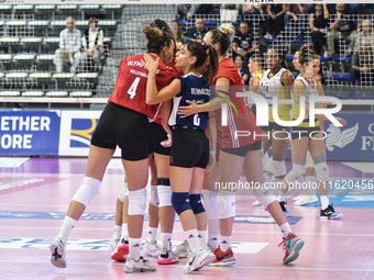 Olympiacos Athens celebrates the team's International Trophy ''Una squadra per un sorriso'' during the final 3rd-4th place match between Was...