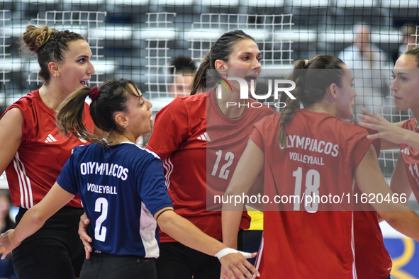 Olympiacos Athens celebrates the team's International Trophy ''Una squadra per un sorriso'' during the final 3rd-4th place match between Was...