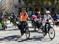 Several hundred people participate in a bike ride in Lyon, France, on September 29, 2024, for the first bike festival. (