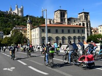 Several hundred people participate in a bike ride in Lyon, France, on September 29, 2024, for the first bike festival. (