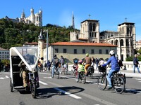 Several hundred people participate in a bike ride in Lyon, France, on September 29, 2024, for the first bike festival. (