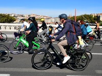 Several hundred people participate in a bike ride in Lyon, France, on September 29, 2024, for the first bike festival. (