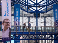 A banner for Tom Tugendhat at the Conservative Party Conference at the International Conference Centre in Birmingham, United Kingdom, on Sep...