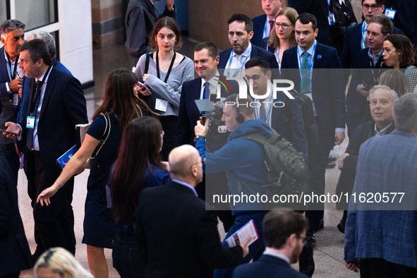 Robert Jenrick MP, the favorite to be the new Tory leader, walks through the ICC surrounded by his security detail at the Conservative Party...