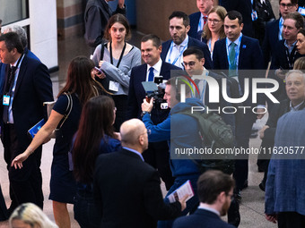 Robert Jenrick MP, the favorite to be the new Tory leader, walks through the ICC surrounded by his security detail at the Conservative Party...