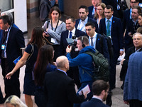 Robert Jenrick MP, the favorite to be the new Tory leader, walks through the ICC surrounded by his security detail at the Conservative Party...