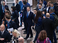 Robert Jenrick MP, the favorite to be the new Tory leader, walks through the ICC surrounded by his security detail at the Conservative Party...