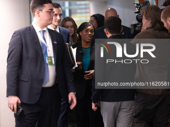 Kemi Badenoch MP, the second favorite to be the new Tory leader, walks through the ICC surrounded by her security detail at the Conservative...