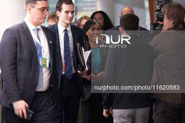 Kemi Badenoch MP, the second favorite to be the new Tory leader, walks through the ICC surrounded by her security detail at the Conservative...