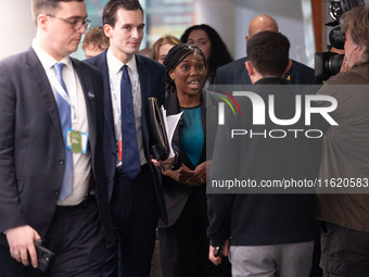 Kemi Badenoch MP, the second favorite to be the new Tory leader, walks through the ICC surrounded by her security detail at the Conservative...