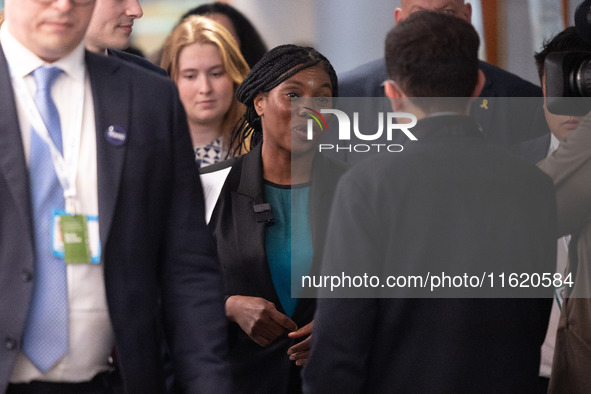 Kemi Badenoch MP, the second favorite to be the new Tory leader, walks through the ICC surrounded by her security detail at the Conservative...