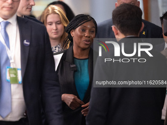 Kemi Badenoch MP, the second favorite to be the new Tory leader, walks through the ICC surrounded by her security detail at the Conservative...